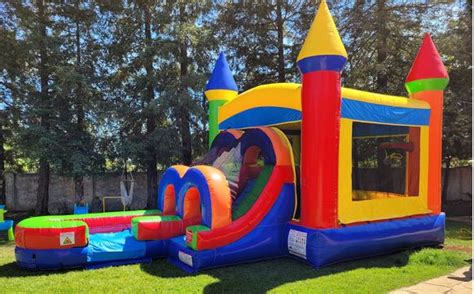 Kids Rainbow Bounce House with Slide by All Star Bounce Houses in Dixon ...