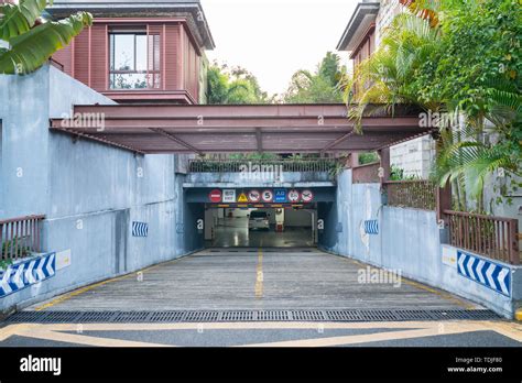 Residential underground parking garage entrance Stock Photo - Alamy