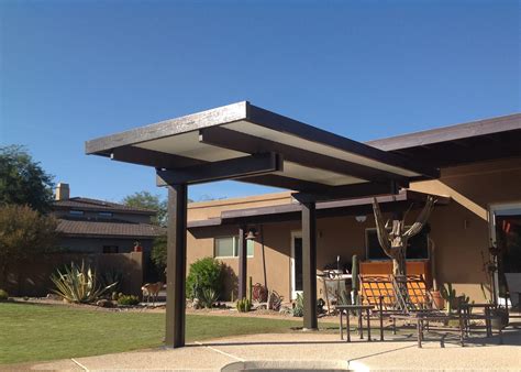 This solid cantilevered pergola protects you from the hot sun while you ...