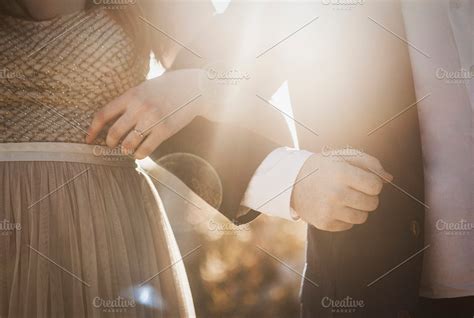 Couple with Linked Arms ~ People Images ~ Creative Market