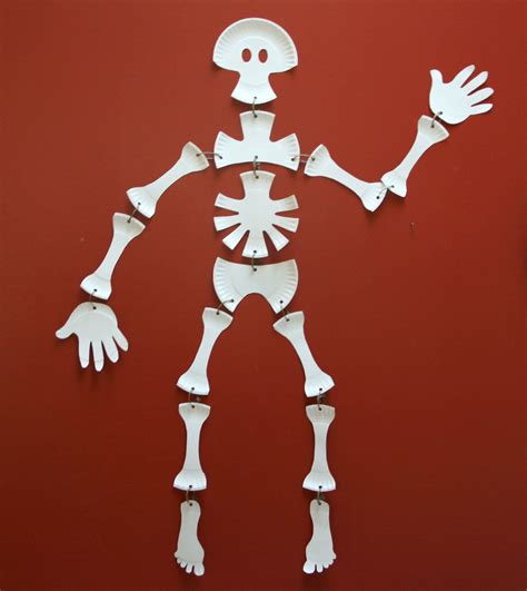 Simple and festive - this paper plate skeleton can be constructed in an hour, and is a blast to ...