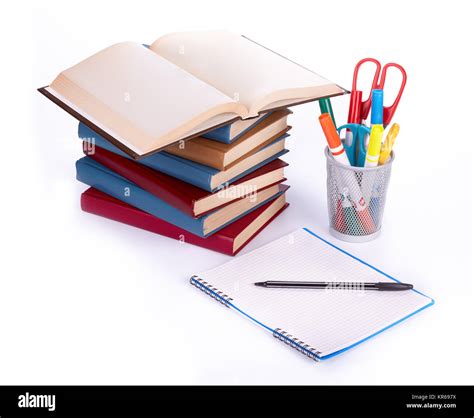 Pile of books, writing-book and pen Stock Photo - Alamy