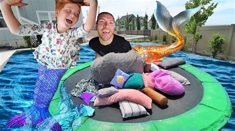 Mermaid PiLLOW FiGHT!! Adley vs Dad magic trampoline battle with a ...