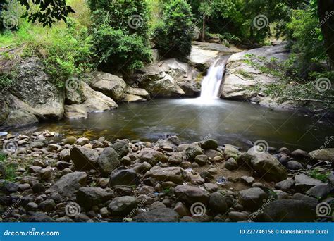 Kurangani Waterfalls in Theni Stock Photo - Image of clouds, mangoes ...