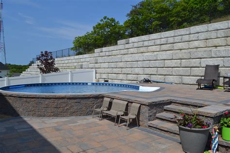 Radiant Semi-Inground Round with Pavers | In ground pools, Backyard pool landscaping, Backyard pool