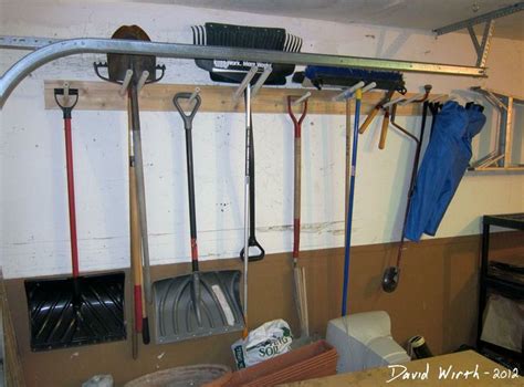 how+to+build+a+garage+tool+rack+wall+mount+hold+shovel+rake+broom ...