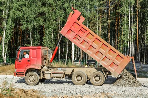 4 Popular Dump Truck Types & Their Uses - C & W Trucking - Bayfield ...