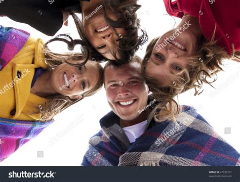 A Group Of Racially-Diverse Young Adults Friends Smiling Together. A View From Below Stock Photo ...