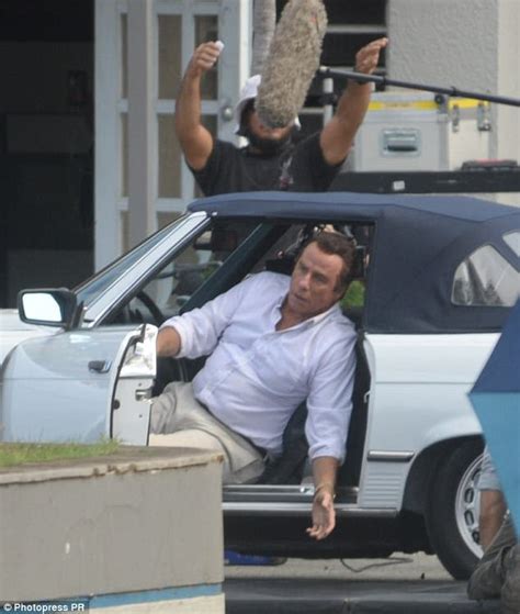 John Travolta's hairpiece stays on during action sequence | Daily Mail Online