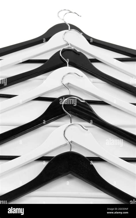 Black and white clothes hangers isolated on white Stock Photo - Alamy