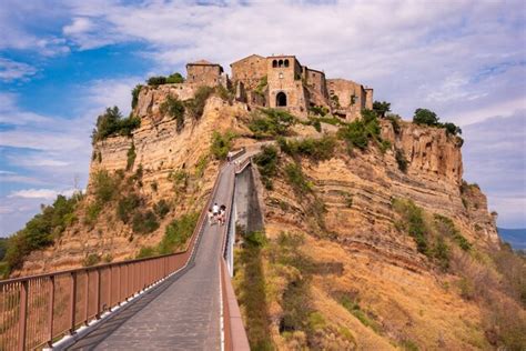 Premium Photo | Ancient town of bagnoregio italy old village on hill with a bridge