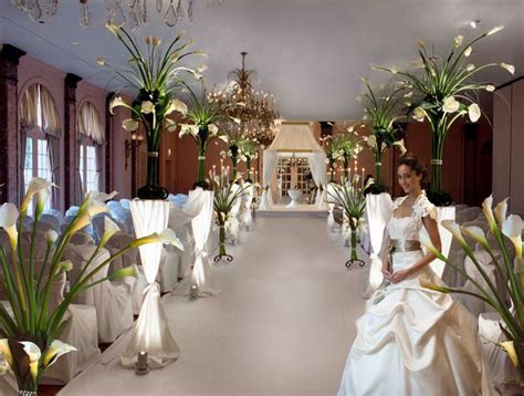 Calla lily arrangement wedding ceremony decor | Wedding aisle decorations, Calla lily wedding ...