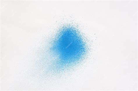 Premium Photo | A blue spray paint stain on a white paper background