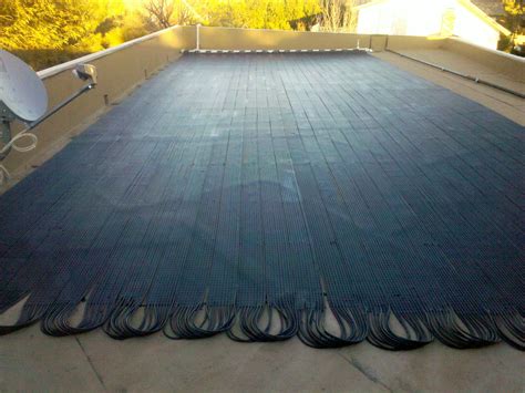 Flat Roof All Black Solar Heating System - Suntopia Solar Pool Heating