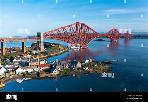 Aerial view of North Queensferry and Forth Bridge ( Forth Railway Bridge, Fife, Scotland, UK ...