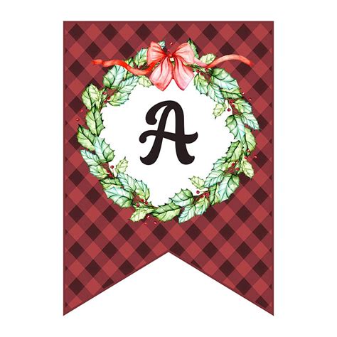 a christmas wreath with the letter a on it and a bow hanging from the front