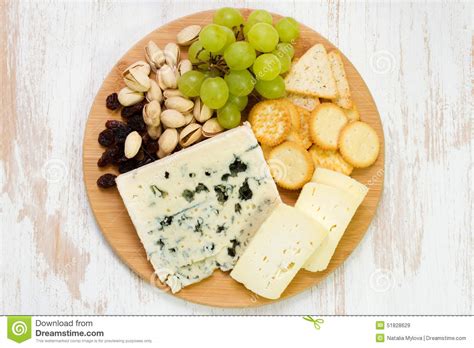 Cheese platter stock image. Image of wooden, delicious - 51828629