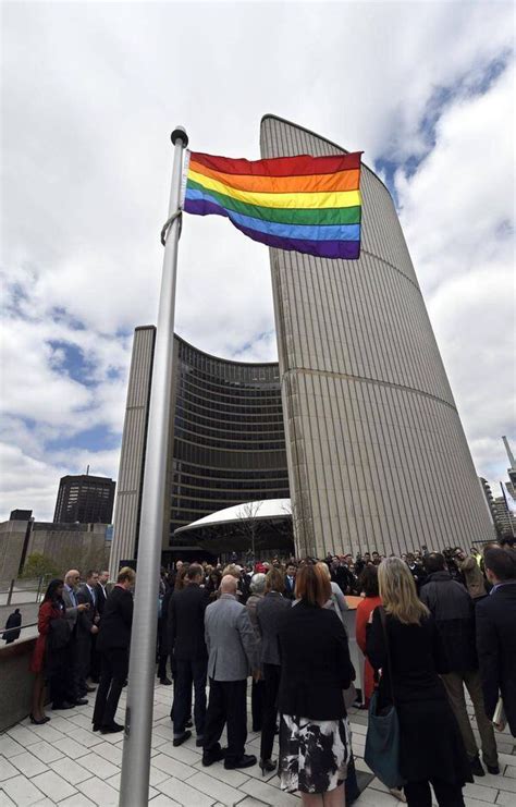 Toronto shows its support by raising pride flag over city hall - The Globe and Mail