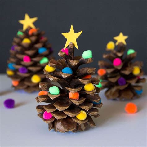 The kids will want to lend a hand with these easy to make Decorated Pine Cone Christmas Trees ...