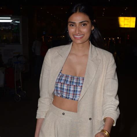 Athiya Shetty ditches the shirt and styles a bandeau top with her pantsuit