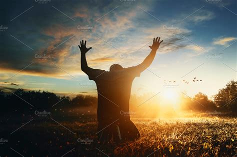 Man raising his hands in worship | High-Quality Holiday Stock Photos ...