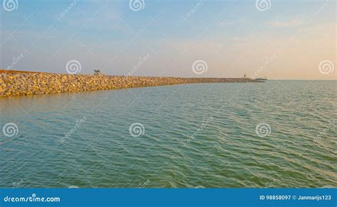 Artificial Island Under Construction in a Lake at Sunset Stock Image - Image of summer, shore ...