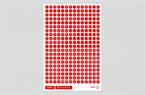 a large red sticker on the side of a white wall with lots of circles