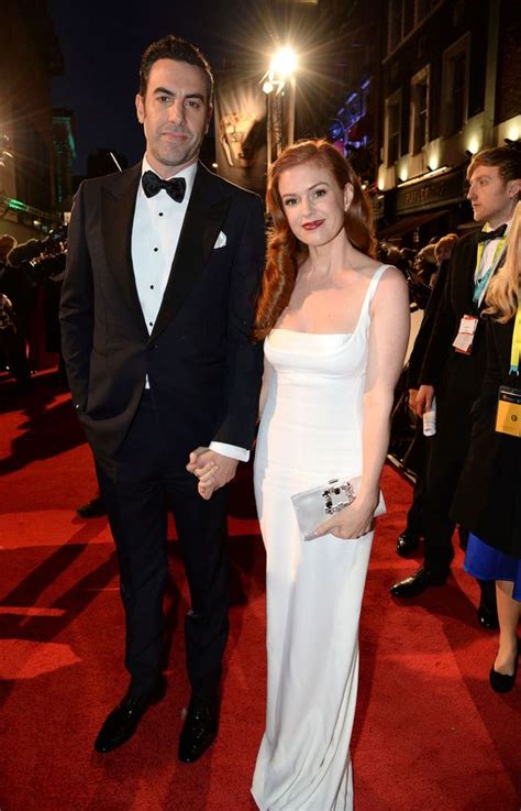 Sacha Baron Cohen looks VERY dapper with gorgeous wife Isla Fisher on ...