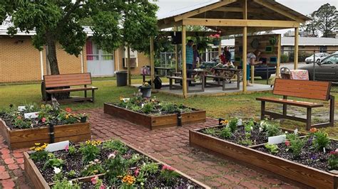 Volunteers build outdoor classroom, garden for James E.Bacon Elementary