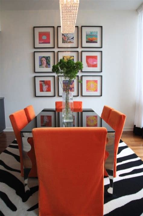 I love the way you can put a black table with orange chairs and a zebra ...