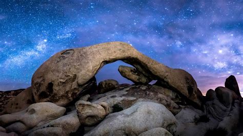 The Milky Way formed over Arch Rock in Joshua Tree National Park ...