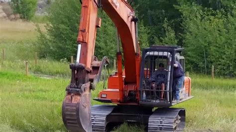 Hitachi Excavator - YouTube