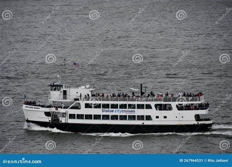 Ferry by Statue City Cruises Running from Manhattan To Statue of ...