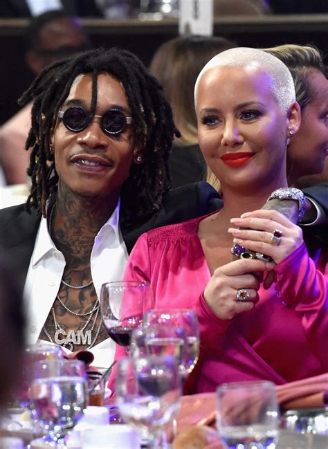 Amber Rose and Wiz Khalifa Pack on PDA at Pre-Grammys Party — See the Pics!