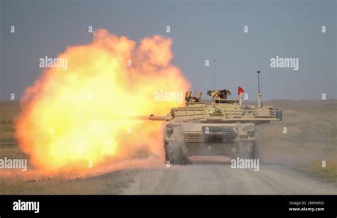 3rd Battalion, 116th Cavalry Regiment M1A2 SEPv2 Abrams Tank crew fires ...