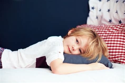 Cute Kid Lying in Bed at Home Stock Photo - Image of handsome, morning: 84151564