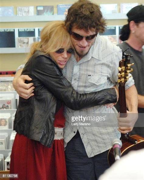 Singer/songwriter Carly Simon hugs her son Ben Taylor after her ...