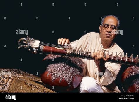 Portrait Of Indian Classical Musician Playing Musical Instrument Rudra ...