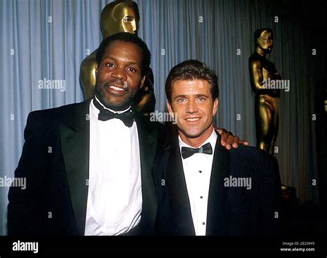 Danny Glover And Mel Gibson at The 60th Academy Awards on April 11, 1988, at the Shrine ...