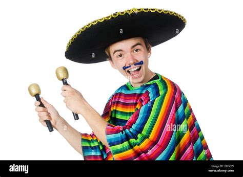 Funny young mexican shaking maracas isolated on white Stock Photo - Alamy