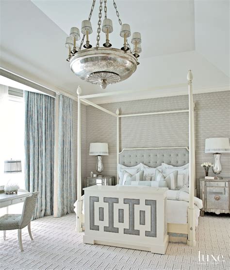 Eclectic Gray Bedroom with Ornate Chandelier - Luxe Interiors + Design