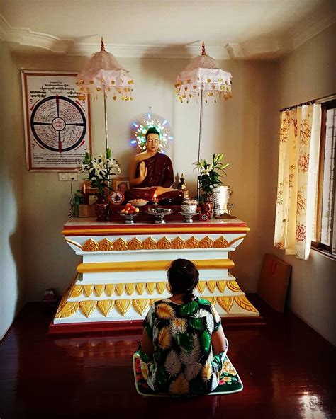 A typical Burmese Buddhist shrine room. One may meditate pay respects ...