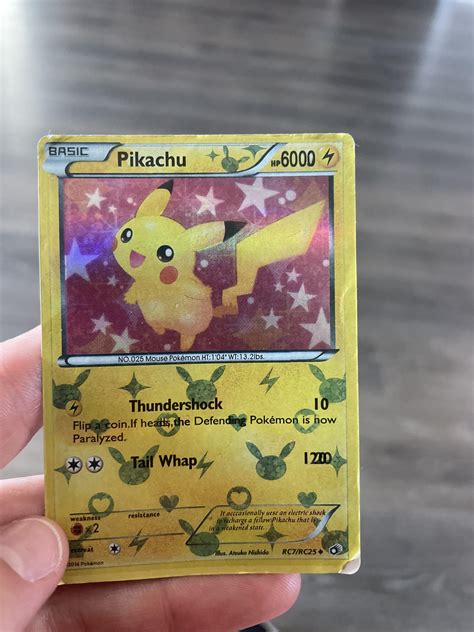 My son found this card in his collection, is this real : r/IsMyPokemonCardFake