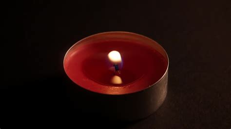 Candle flame burning close up 20519055 Stock Video at Vecteezy