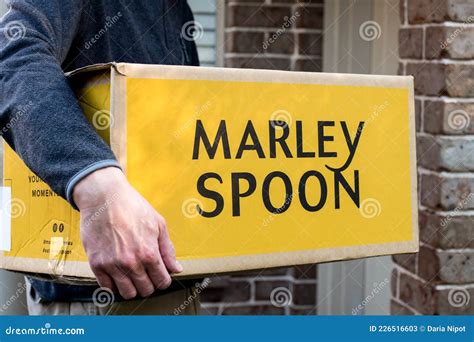 Delivery Man Holding Marley Spoon Meal Kits in a Box Near the Front Door Editorial Stock Photo ...