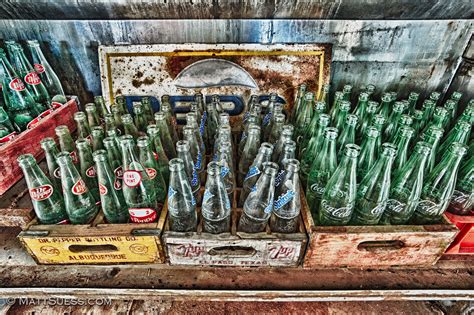Old empty glass soda bottles Dr Pepper Sunkist Coca Cola Coke
