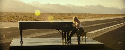 Lady Gaga Plays a Steinway Grand Piano in 'Hold My Hand' Video