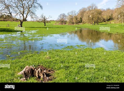 The Thames Path long distance walking trail beside the infant River ...