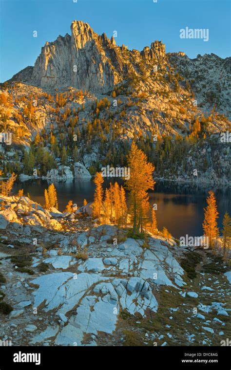 Prusik Peak rises over Lake Viviane at sunrise in the Enchantments section of the Alpine Lakes ...