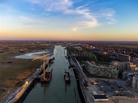 Aerial View of the High Rise Buildings on the Side of the Flowing Yser River in Belgium ...